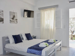 A studio apartment with an integrated kitchen/dining area that can accommodate u Greece Studio With Kitchen For 4  (Ios Centre) Free WiFi Entire rental unit vacation rental 18301265