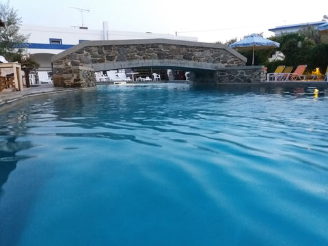 A bright house located in a Syros' village, Vari . We provide you a big parking  Athens, Greece cozy home with swimming pool Entire home vacation rental 32610596