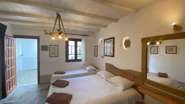 welcome to the beautiful island of ios.....<br />a lovely room for our guests ex Greece 5.3) Five bed room next to the beach Private room vacation rental 12646137