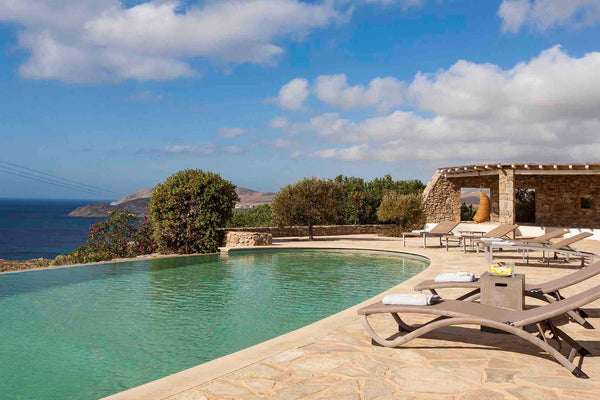 This dreamy residence is set in the quiet natural area above Lia beach. The prop Greece Elegant Seaside Villa, great views, infinity pool Cycladic home vacation rental 6994922