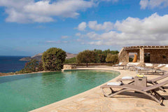This dreamy residence is set in the quiet natural area above Lia beach. The prop Greece Elegant Seaside Villa, great views, infinity pool Cycladic home vacation rental 6994922