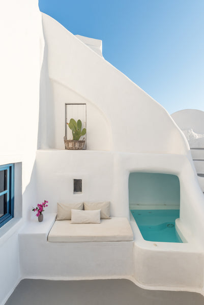 The two separate, white washed cave houses are carved in the mountain in the hea Oia, Greece White Cellar Cave Houses by Cycladica Cycladic home vacation rental 13237937