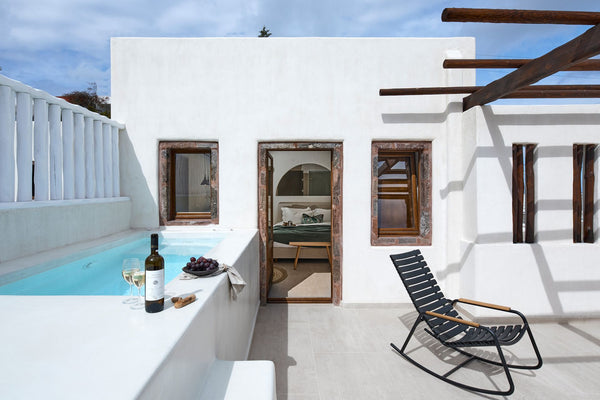 Spacious and airy, the Executive Suite boasts an elegant ambiance deriving from   Winery Hotel 1870-Executive Suite with Outdoor Hot Tub Room in hotel vacation rental 44328388
