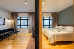 Our One-Bedroom Apartment is a modern and cozy place of 48 m2 lined with Oak Woo Athens, Greece One-Bedroom Apartment without View by Kin Athens Entire rental unit vacation rental 43006725