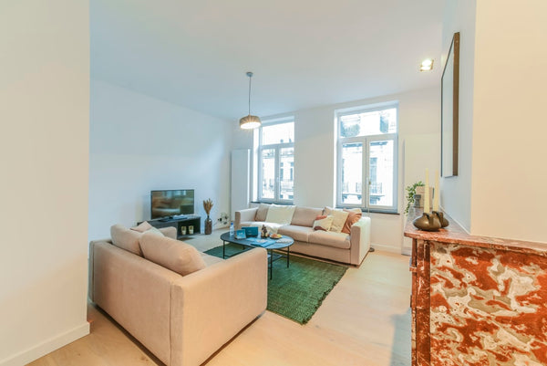 This spacious two-bedroom apartment is full of light. The dining table will be p Brussels, Belgium Sweet Inn | Spacious 2BR Apt. in Sainte Catherine Entire rental unit vacation rental 39571400