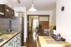 The flat, 35m2, is composed by a living kitchen with vue on our raised court, a  Paris, France 3 pers-charming,Village Belleville Entire rental unit vacation rental 4674417