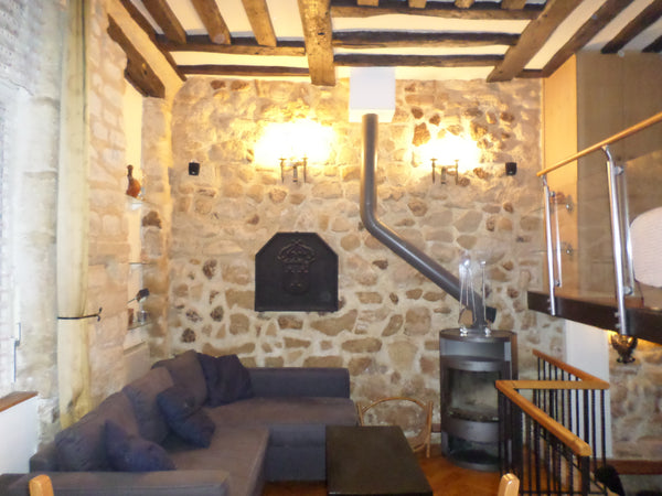 This loft is one-of-a-kind, with exposed rock and wood beams. Located on the fir  Loft 107 rue Mouffetard Entire loft vacation rental 9600858