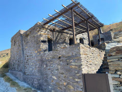 Alonaki Tinos Rental Cottage house, a traditional property made of rock with a t  Alonaki Tinos Rental Cottage house Entire place vacation rental 50995477