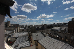 In a old building (XVIIth century), a flat at the sixth floor, with a small terr Paris, France Beautiful view on the roof of Paris Entire rental unit vacation rental 23840529