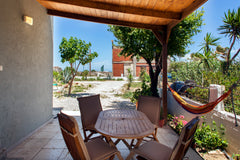 Cosy, small, two-storey single-standing house one minute walk to the beach of Am Heraklion, Greece Cosy detached maisonette by the sea Entire home vacation rental 24815941