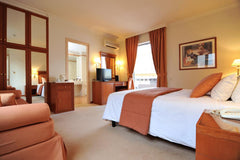 The Atrium guest rooms and suites are fitted with warm colours and tasteful furn GR Family Bedroom Room in hotel vacation rental 30588215