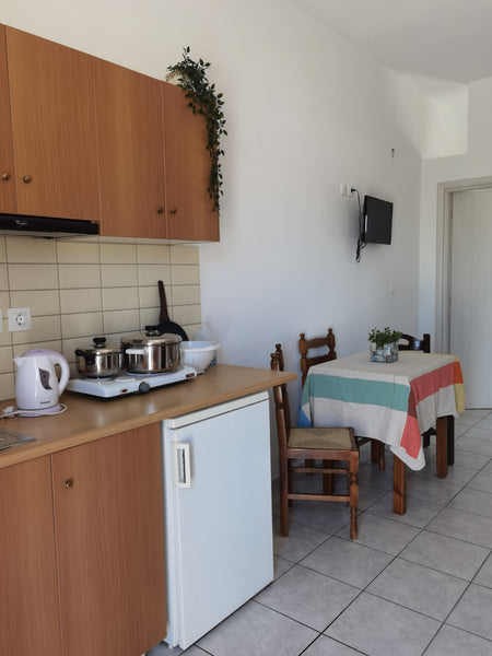 We are a family, having 10 seperated  apartments and we will be happy to accomod Greece Large apartment with balcony , close to the beach Entire serviced apartment vacation rental 36616934