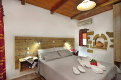 A traditional 1-bedroom House with an open plan living room (with fireplace) and Chania, Greece 1-bedroom Topolia House, sharing pool Entire rental unit vacation rental 21831767