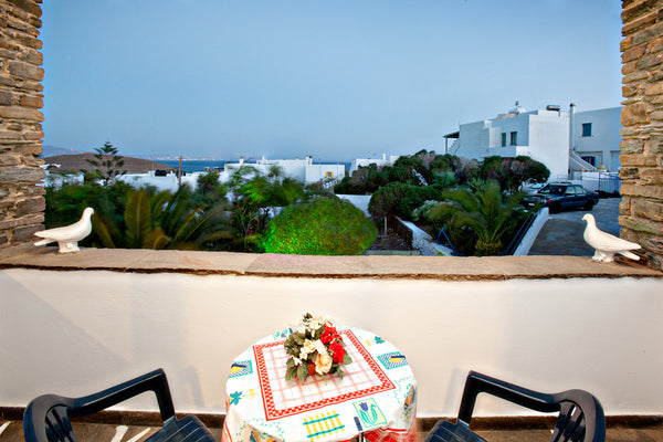 The apartment has traditional design and sea view.It has fully equipped kitchen,  Irini Studios Tinos Private room in rental unit vacation rental 18411428