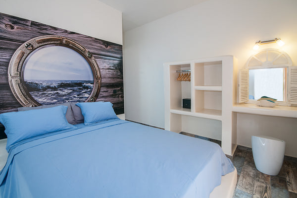 This amazing appartment situated on the 1st floor, has a balcony with mountain a Kamari, Greece BLUE DREAM APPARTMENT (Sea and mountain view) Entire rental unit vacation rental 13365903