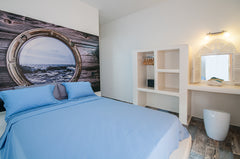 This amazing appartment situated on the 1st floor, has a balcony with mountain a Kamari, Greece BLUE DREAM APPARTMENT (Sea and mountain view) Entire rental unit vacation rental 13365903