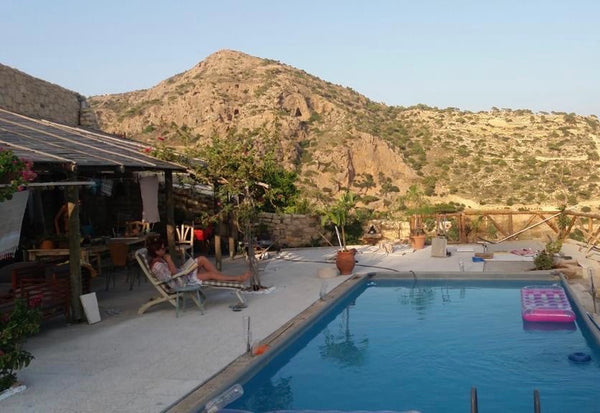 A big traditional stone house suited on the hillside.<br />The house is featured Makrygialos, Greece Private room in Cretan House with pool & sea view Private room in villa vacation rental 41494964