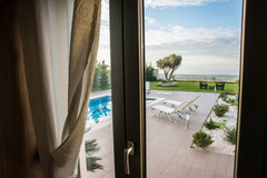 Featuring stylish furnishings in light colors with traditional touches, the eleg Crete, Greece Villa Horizon: Privacy, Scenic Views & Exterior Entire home vacation rental 6849094