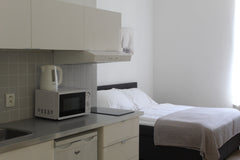 It is a bright and cozy studio apartment equipped with a double bed, a sofa, a c Prague, Czechia Comfortable Apartment Soukenicka Entire rental unit vacation rental 628831711631364308