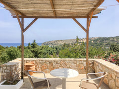 A detached studio villa that sleeps 4 with a private terrace and great views of   Villa Nafsika with Sarakiniko View and Great WiFi Entire serviced apartment vacation rental 47793717