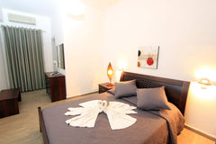 Offering a shower these air-conditioned rooms has a flat-screen, satellite TV. I Greece Gianna Suties "Economy Double Room" Room in hotel vacation rental 6300265