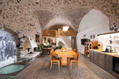 Villa#2 comes in 2 level floors and accommodates up to 6 people. On the ground f Athens, Greece Canava Villas II - Private Pool - Santorini Earthen home vacation rental 25311839