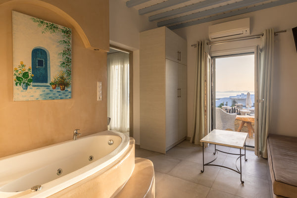 A beautifully designed new suite created in 2018 with separate bedroom and king  Greece Suite with Sea View indoor jacuzzi bath. Mykonos. Private room in bed and breakfast vacation rental 7369826