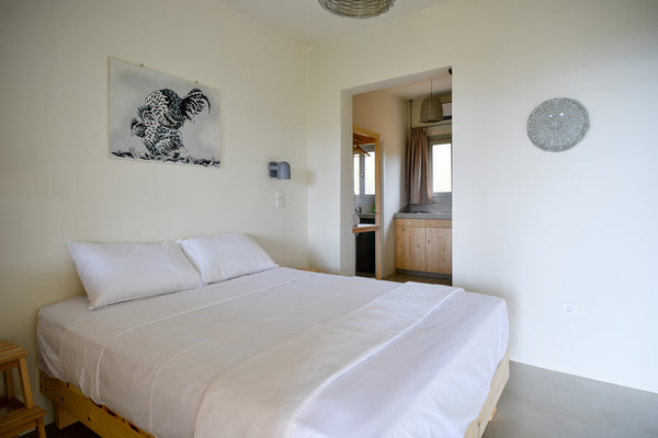 Facing the beachfront in Ándros, Rooster Miniature Apts features a garden.<br /> Athens, Greece Rooster Guesthouse Rooms - Junior Apartment Entire rental unit vacation rental 30781776