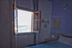 This room is an independent part ( private entrance and bathroom) of a beautiful Greece Room with a vew Private room in cycladic house vacation rental 16788774