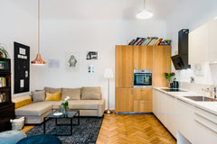 Cook on an electric stove in a smartly-designed kitchen and dine on the smooth g Prague, Czechia Explore Old Town from a Hip, Book-Filled Apartment Entire rental unit vacation rental 8628982