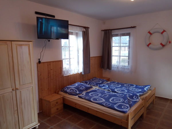 Jednoduché ubytování v jedné místnosti s vlastní kuchyňskou linkou, WC a koupeln  Garden apartment Ořech Private room in condo vacation rental 33865273