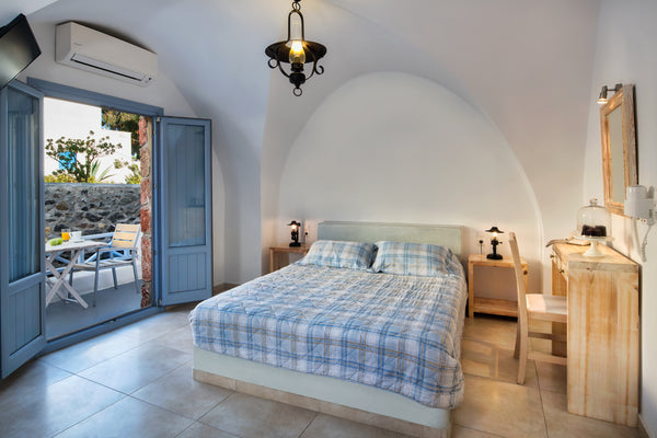 One of our four rooms in the new hotel wing where the old winery warehouses ('ca Thira, Greece THOLOS Private room in cave vacation rental 31980125