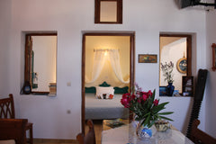 The air-conditioned rooms at Vrachia Traditional Apartments have wooden furnishi  Vrachia Apartments with Sea View Entire rental unit vacation rental 11050689