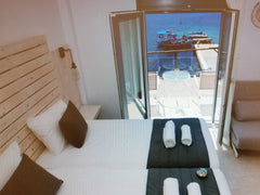 a newly renovated apartment,  on the seashore of Telendos island, with magnifice  KELERIS Apartment - AFRODITE LUXURY ROOMS TELENDOS Entire rental unit vacation rental 36740817