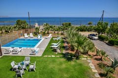 Mariza's Beachfront Apartment with Pool is built on the sandy beach of Analipsi, Greece Mariza's Beachfront Apartment with Private Pool Entire rental unit vacation rental 50885093