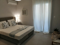 Nostos is a brand new one-bedroom stylish apartment in Perivolia, conveniently l Greece Nostos, 2 min from the beach, no car needed. Entire rental unit vacation rental 35048983