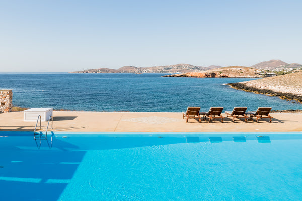 Wake up to the gentle sounds of waves brushing the shoreline in this two-story v Athens, Greece Waterfront Villa with Breathtaking Views and Sea Waves Sound Cycladic home vacation rental 2629256