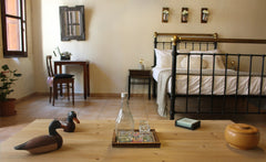 Stay in the heart of the old town in a lovely apartment on the 1st floor of a tr Greece ‘Μιναρές’ Traditional apartment, on Daliani Street Entire rental unit vacation rental 24339377