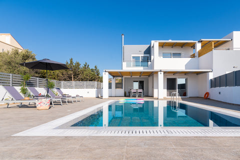 A 2 bedroom villa with a private pool. Fast mesh wi-fi, 55" smart TV, and free N Greece South Beach Villas - 2 bedroom sea view with pool Entire villa vacation rental 48827338