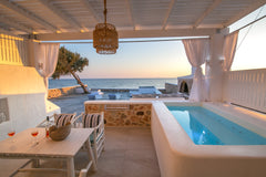 Our Elegant Suite radiates a warm atmosphere of unpretentious luxury with exquis  Aegean Melody Suites-Elegant Suite,Outdoor Jacuzzi Private room in bed and breakfast vacation rental 41631114