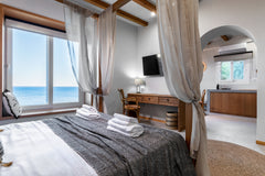 In southeast Crete and literally next to the sea is the apartment with a modern   Almare. A gem in front of the sea waves. Entire condo vacation rental 667767291828942021