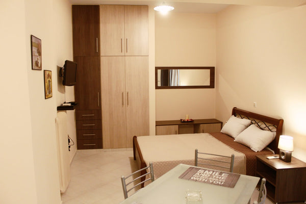 Enjoy your stay in our urban renovated studio ground floor apt, in one of Athens Athens, Greece Studio in Pagkrati • Close to Euaggelismos metro Entire rental unit vacation rental 26144602