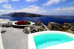 Combining traditional and modern architecture this cave-style room offers unique Greece Private Cave House with hot tub and Sunset View Room in boutique hotel vacation rental 32107126