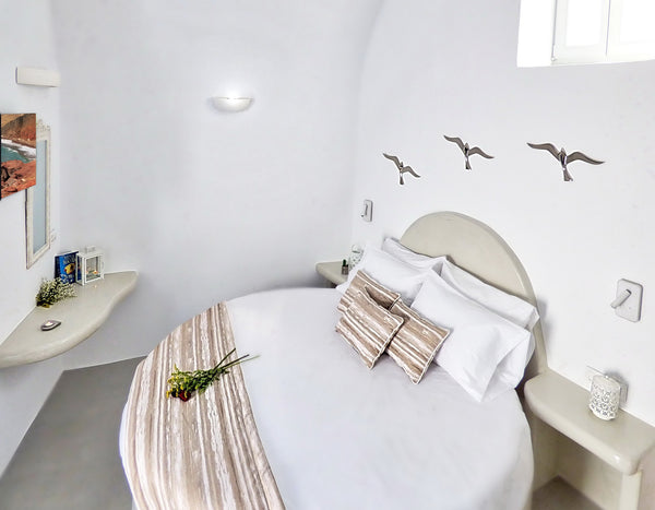 Harmony Circle is a Round Bed Suite for your summer vacations in the village of  Akrotiri, Greece Sweet cave with cave bath Entire serviced apartment vacation rental 48467513