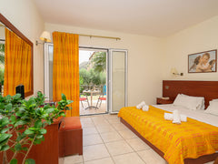 Hotel Calypso is an iconic and family friendly hotel located in the village of t Rethimnon, Greece Calypso - Quadruple Room with Garden and Pool View Room in hotel vacation rental 44730556