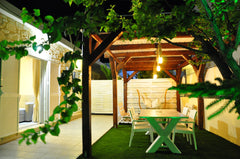 A brand new apt. just 100m from Ag. Marina beach, with 90 sq. meters of private   Garden Apartment with veranda near Ag.Marina beach Entire rental unit vacation rental 24637957