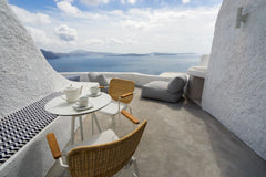 Enjoy the dazzling Aegean Sea with a glass of wine and your beloved one.<br /><b Oia, Greece Canvas Suites | Azure Suite with Caldera View Cycladic home vacation rental 9378899
