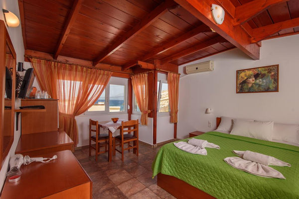 This property is 2 minutes walk from the beach. The family-run Nikos Hotel is lo  comfortable large room with gorgeous view Room in boutique hotel vacation rental 24684970