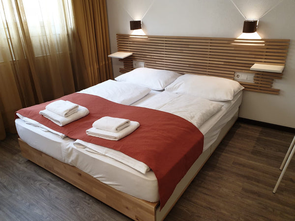 The Luxury 1BR-Apartment features 1 bedroom, 1 living room with a flat-screen TV  Luxury 1BR Apartment (2-4) Entire rental unit vacation rental 53375547