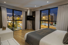 With stunning views of the city, the Studio Apartment is 27 sqm that provides sp Athens, Greece Studio Apartment -The Convo 212- Room in hotel vacation rental 47738206